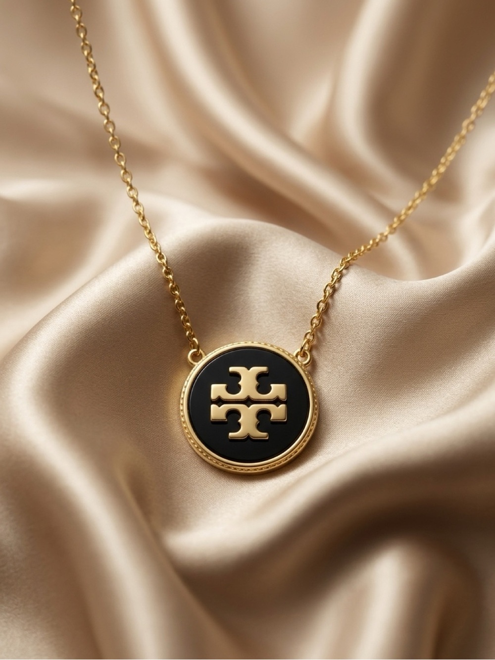 Tory Burch Black and Gold Pendant Necklace